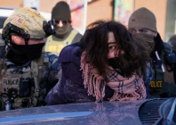 a person is detained at the scene of a shooting involving federal immigration agents in minneapolis minnesota us january 24 2026 photo reuters