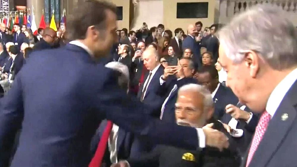 french president ignores indian prime minister modi in ai summit photo video grab french president ignores indian prime minister modi in ai summit photo video grab