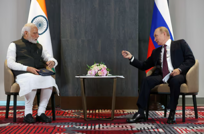 russian president vladimir putin and indian prime minister narendra modi attend a meeting on the sidelines of the shanghai cooperation organization sco summit in samarkand uzbekistan september 16 2022 photo reuters