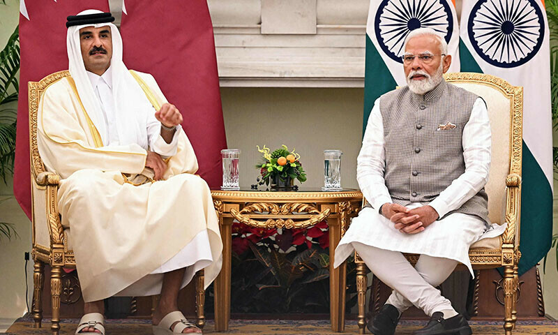 qatar s emir sheikh tamim bin hamad al thani l and india s prime minister narendra modi attend the signing of memorandum of understanding agreements at the hyderabad house in new delhi on february 18 photo afp