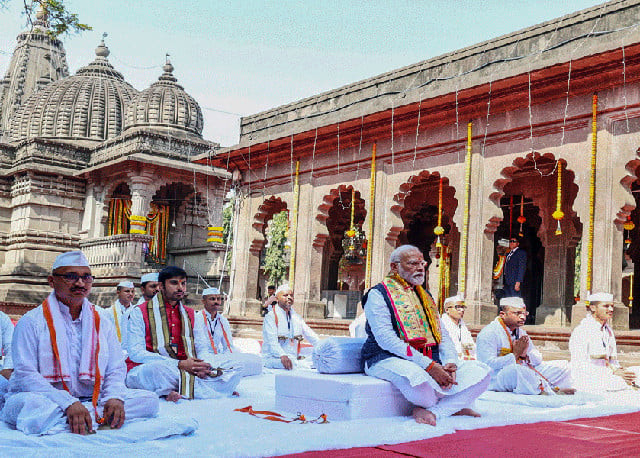 indian prime minister narendra modi c offers prayers at the kalaram temple in nashik photo afp indian prime minister narendra modi c offers prayers at the kalaram temple in nashik photo afp