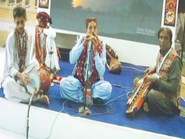 from the ancient heart of mohenjo daro the 5 000 year old bhorrindo breathes again in sindh its clay curves singing in hypnotic flute like tones revived by folk musician faqeer zulfiqar and crafted by devoted artisans like allah jaryo the instrument bridges millennia photo express