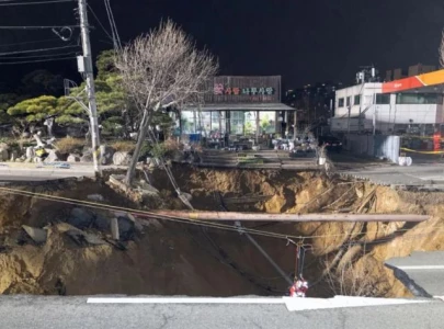 sinkhole swallows motorcyclist in seoul sinkhole swallows motorcyclist in seoul