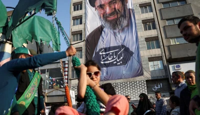 a banner with a picture of iran s supreme leader mojtaba khamenei on a building during a rally in support of him in tehran iran june 4 2026 photo reuters