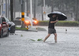 typhoon matmo hits southern china during peak holiday season typhoon matmo hits southern china during peak holiday season