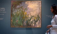 a visitor walks past the painting iris 1924 1925 by french painter claude monet 1840 1926 during the presentation of 28 art works from the schlumberger collection ahead of the auction at sotheby s auction house in paris france september 17 2026 photo reuters a visitor walks past the painting iris 1924 1925 by french painter claude monet 1840 1926 during the presentation of 28 art works from the schlumberger collection ahead of the auction at sotheby s auction house in paris france september 17 2026 photo reuters