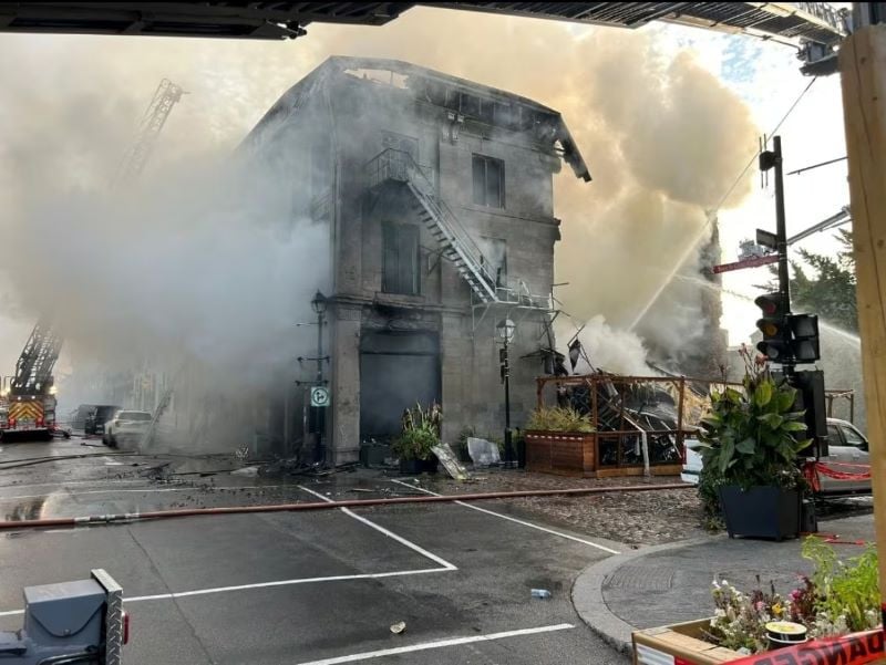 firefighters are still working to put out the large fire that destroyed the building on notre dame street friday morning submitted by the association des pompiers de montr al