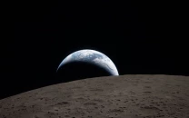 artemis ii crew snaps historic earthset photo on way home