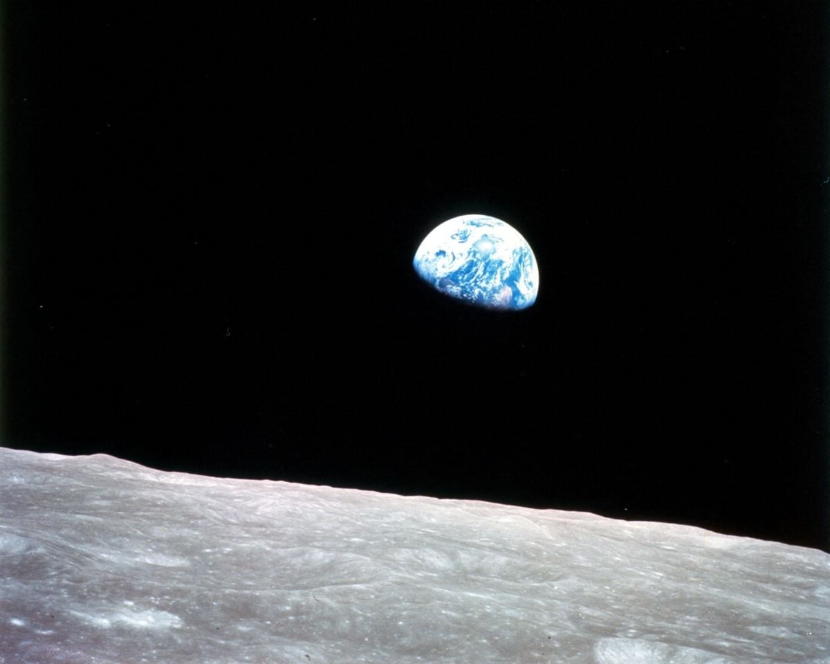 This NASA image obtained on April 22, 2009, Earth Day, shows the Earthrise over the moon made on Christmas Eve, Dec. 24, 1968 from Apollo 8, the first manned mission to the moon, as it entered lunar orbit.PHOTO: AFP