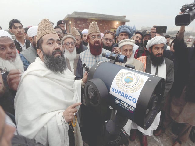 ruet e hilal committee chairman maulana abdul khabir azad scans the skies for the ramazan crescent at auqaf hall photo app