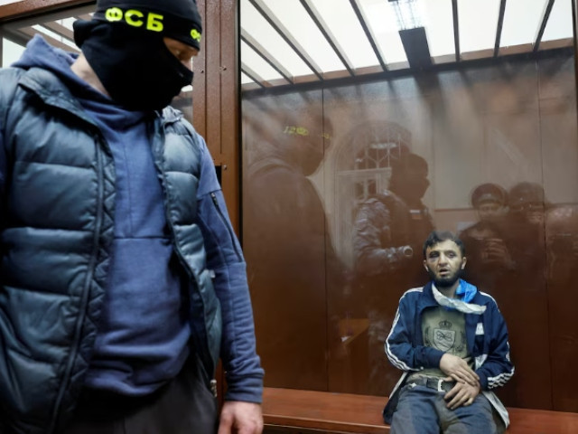 russians lower flags in mourning suspects charged in deadly concert hall attack russians lower flags in mourning suspects charged in deadly concert hall attack