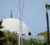 a police officer stands guard as emergency workers respond at the scene of a reported active shooter situation at the islamic center in san diego california us may 18 2026 reuters
