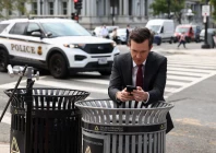 ms now white house correspondent vaughn hillyard leans on a waste bin he jokingly referred to as his new desk on a street corner near the white house after us president donald trump banned three major news outlets cnn ms now and politico from the white house in washington d c us september 21 2026 photo reuters