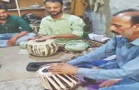 israr hussain checks a tabla in his workshop in dijkot photo app