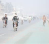 commuters pass through dense smog in multan photo app