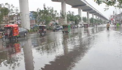 vehicles splash through a rain soaked stretch of multan road in lahore after heavy downpour leaves parts of the city waterlogged photo ppi