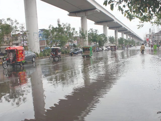 vehicles splash through a rain soaked stretch of multan road in lahore after heavy downpour leaves parts of the city waterlogged photo ppi vehicles splash through a rain soaked stretch of multan road in lahore after heavy downpour leaves parts of the city waterlogged photo ppi