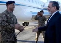 photo taken and provided by the iranian foreign ministry on april 15 2026 shows iran s foreign minister abbas araghchi r welcoming army chief field marshal asim munir upon his arrival at the airport in tehran photo afp