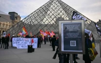louvre shuts to visitors as staff strike over working conditions
