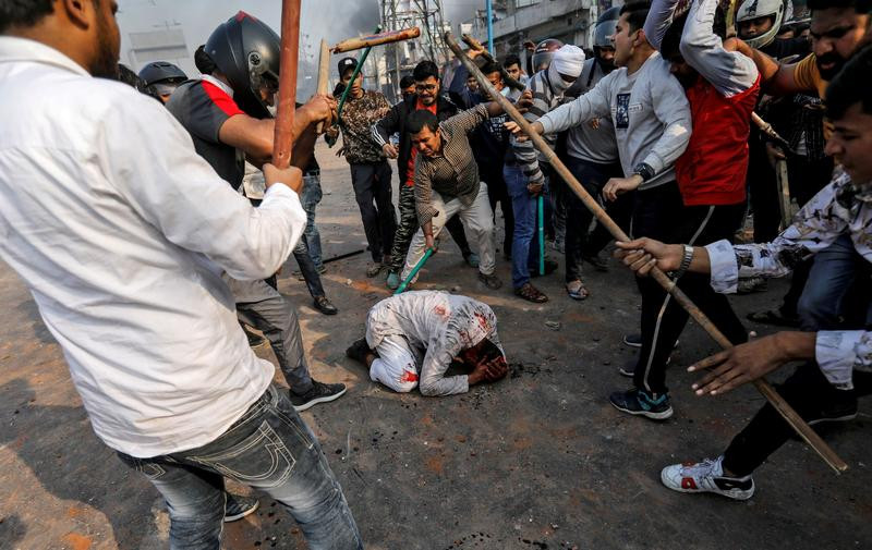 a group of men chanting pro hindu slogans beat mohammad zubair 37 who is muslim during protests sparked by a new citizenship law in new delhi india photo reuters file