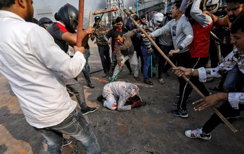a group of men chanting pro hindu slogans beat mohammad zubair 37 who is muslim during protests sparked by a new citizenship law in new delhi india photo reuters file a group of men chanting pro hindu slogans beat mohammad zubair 37 who is muslim during protests sparked by a new citizenship law in new delhi india photo reuters file