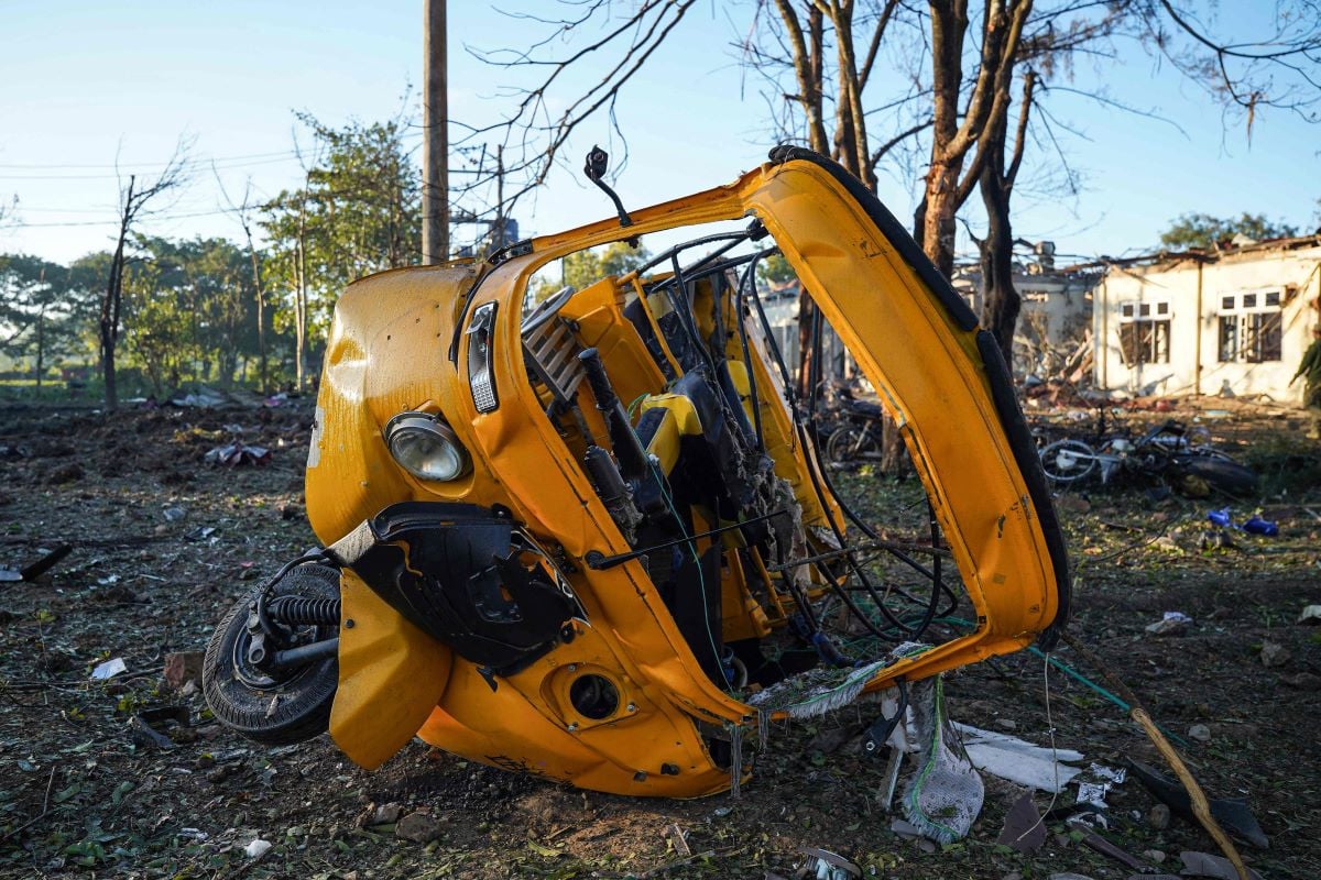 This picture shows a vehicle damaged in a Myanmar military air strike that killed more than 30 people at a hospital in Mrauk U, western Rakhine state on December 11, 2025. PHOTO:AFP