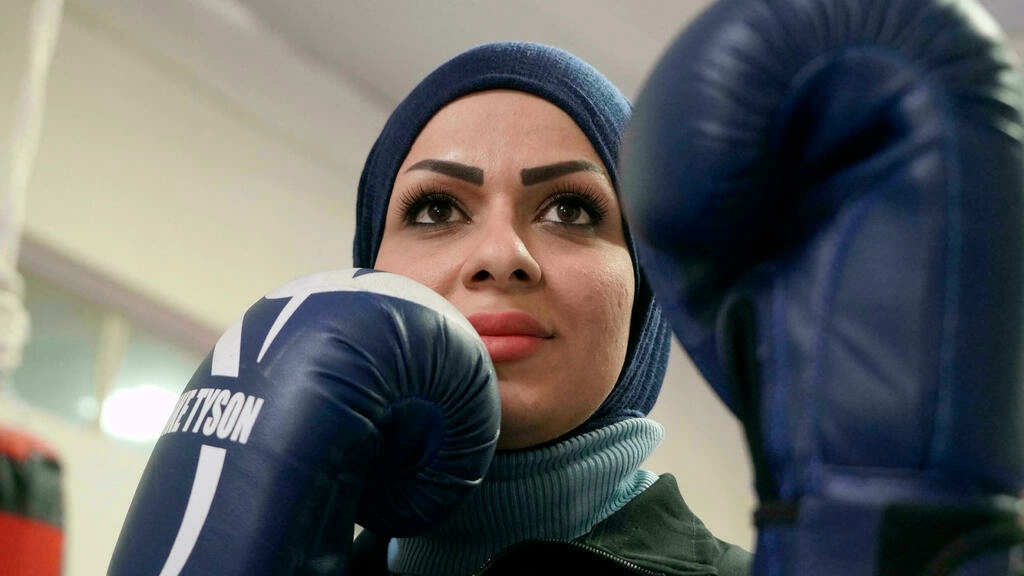 bushra al hajjar a 35 year old iraqi boxing instructor is pictured during a training session in najaf afp
