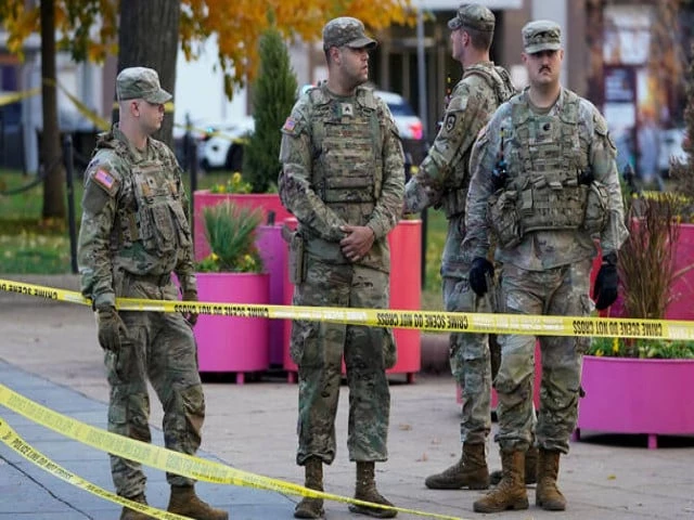 national guard members stand in a cordoned off area after two national guard members were reportedly shot near the white house in washington d c us on november 26 2025 photo reuters