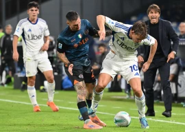 como s nicolas paz fights for the ball with napoli s matteo politano during the italian serie a match at the diego armando maradona stadium in naples photo afp