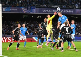 napoli s rasmus hojlund tries to score against frankfurt s goalkeeper michael zetterer during the uefa champions league match at the diego armando maradona stadium in naples photo afp