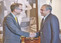 interior minister mohsin naqvi shakes hands with director general of the uk s nca graeme biggar in islamabad photo app