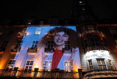 a picture of nobel peace prize winner narges mohammadi on the wall of the grand hotel in central oslo before the nobel banquet in connection with the awarding of the nobel peace prize 2023 in oslo norway december 10 2023 photo reuters