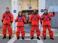 artemis ii crew members from left csa canadian space agency astronaut jeremy hansen and nasa astronauts christina koch victor glover and reid wiseman walk out of astronaut crew quarters inside the neil armstrong operations and checkout building to the artemis crew transportation vehicles prior to traveling to launch pad 39b as part of an integrated ground systems test at kennedy space center in florida on sept 20 2023 to test the crew timeline for launch day photo nasa