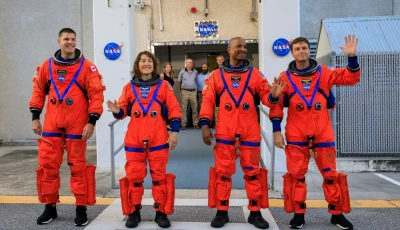 artemis ii crew members from left csa canadian space agency astronaut jeremy hansen and nasa astronauts christina koch victor glover and reid wiseman walk out of astronaut crew quarters inside the neil armstrong operations and checkout building to the artemis crew transportation vehicles prior to traveling to launch pad 39b as part of an integrated ground systems test at kennedy space center in florida on sept 20 2023 to test the crew timeline for launch day photo nasa