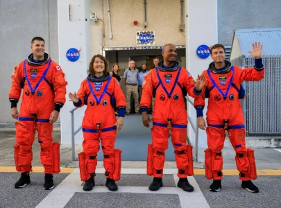 nasa launches four astronauts on world s first crewed lunar mission in half a century