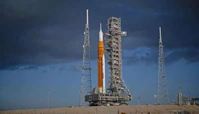 nasa s sls space launch system rocket and orion spacecraft secured to the mobile launcher are seen as they arrive at the launch pad 39b friday march 20 2026 at nasa s kennedy space center in florida photo nasa nasa s sls space launch system rocket and orion spacecraft secured to the mobile launcher are seen as they arrive at the launch pad 39b friday march 20 2026 at nasa s kennedy space center in florida photo nasa