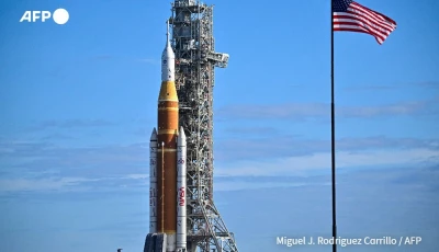 nasa on saturday rolled out its towering sls rocket and orion spacecraft photo afp