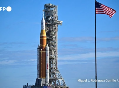 nasa moves moon rocket to launch pad