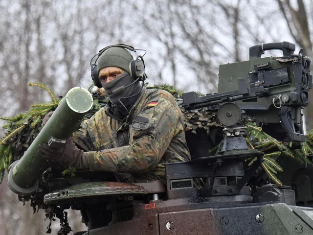 a soldier installs a mells military system on a marder tank as the marder fighting vehicle company of the armoured infantry brigade 37 takes part in nato s high readiness task force in marienberg germany january 12 2023 photo reuters