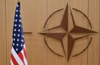 this photo shows the logo of the north atlantic treaty organisation nato and the us flag at nato headquarters in brussels belgium on february 17 2025 photo reuters
