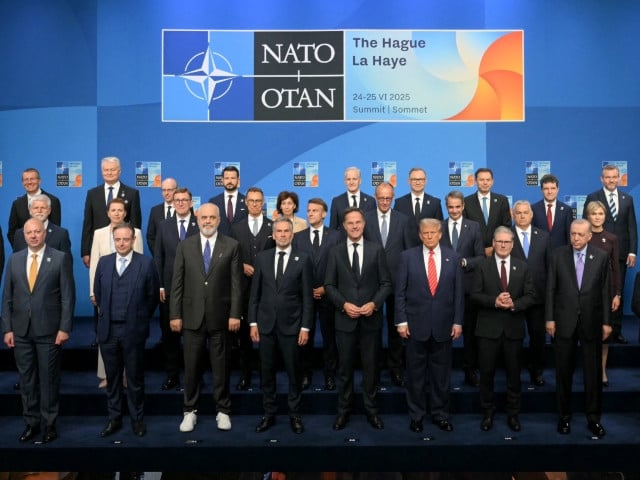 (Front row from 5L) Netherlands' Prime Minister Dick Schoof, NATO Secretary General Mark Rutte, US President Donald Trump, Britain's Prime Minister Keir Starmer, Turkey's President Recep Tayyip Erdogan pose NATO country leaders for a family photo during the North Atlantic Treaty Organization (NATO) Heads of State and Government summit in The Hague, on June 25, 2025. NATO leaders hold a two-day summit on June 24 and 25 in The Hague. Photo: AFP