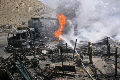 one dead as nato oil tanker torched in balochistan