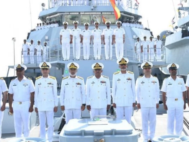 the handout photograph released by pakistan navy on april 14 2025 shows chief of naval staff admiral naveed ashraf center front row pose for a group photo along with senior naval and ship s company officials during the induction ceremony of offshore patrol vessel pns yamama in karachi photo courtesy dg pr pakistan navy the handout photograph released by pakistan navy on april 14 2025 shows chief of naval staff admiral naveed ashraf center front row pose for a group photo along with senior naval and ship s company officials during the induction ceremony of offshore patrol vessel pns yamama in karachi photo courtesy dg pr pakistan navy