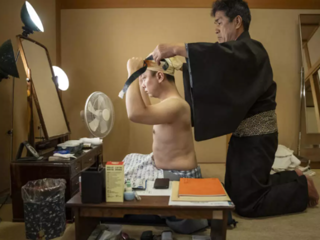 A fresh creation is crafted for each kabuki performance and customised for each actor, taking between a few hours and a month to complete depending on the complexity © Yuichi YAMAZAKI / AFP