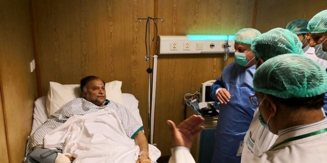 nawaz visits iqbal at the hospital photo express