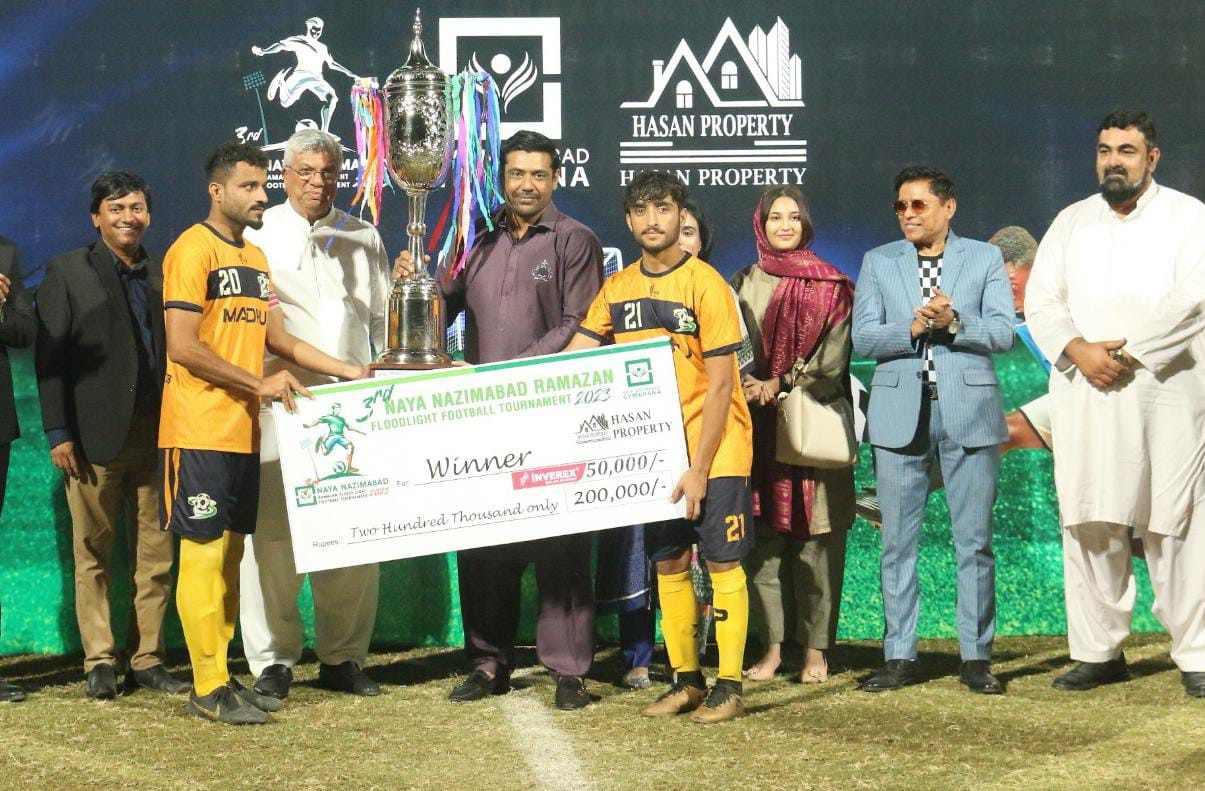 the winners of naya nazimabad ramzan floodlight football tournament receiving their prize photo courtesy organisers