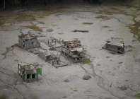 an arial view shows buildings near trishuli river damaged and covered in mud following deadly flash floods and a mudslide in betrawati bazaar in rasuwa district nepal august 30 2026 photo reuters