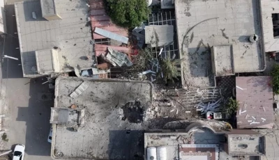 a screengrab from a drone video taken on september 2 shows damage to a courtyard and a hole in the roof of a home where a wedding ceremony was held screengrab reuters