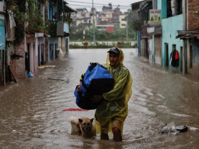 landslides have blocked roads into kathmandu isolating nepal s flooded capital from the rest of the country photo reuters