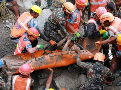 death toll from floods on nepal china border climbs to 1 410 with over 5 650 still missing
